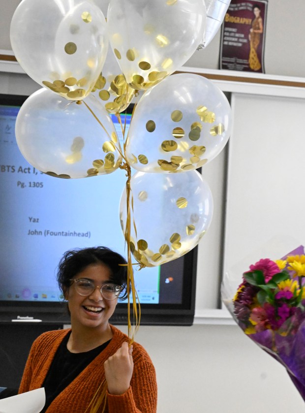 Amaiya Kavachery, a student at Lehigh Career Technical Institute, is awarded a full-tuition scholarship to Cedar Crest College Tuesday, April 9, 2024, at LCTI in North Whitehall Township. Kavachery was the winner of the college's annual scholarship competition, and was presented with her full-tuition prize, flowers and an appearance from Franki the Falcon. (Monica Cabrera/The Morning Call)