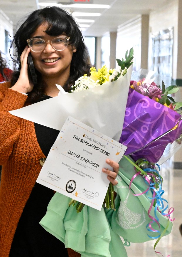 Amaiya Kavachery, a student at Lehigh Career Technical Institute, is awarded a full-tuition scholarship to Cedar Crest College Tuesday, April 9, 2024, at LCTI in North Whitehall Township. She said he was ecstatic and calls family to let them know the news. Kavachery was the winner of the college's annual scholarship competition, and was presented with her full-tuition prize, flowers and an appearance from Franki the Falcon. (Monica Cabrera/The Morning Call)