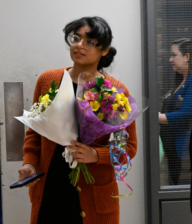 Amaiya Kavachery, a student at Lehigh Career Technical Institute, is awarded a full-tuition scholarship to Cedar Crest College Tuesday, April 9, 2024, at LCTI in North Whitehall Township. Kavachery was the winner of the college's annual scholarship competition, and was presented with her full-tuition prize, flowers and an appearance from Franki the Falcon. (Monica Cabrera/The Morning Call)