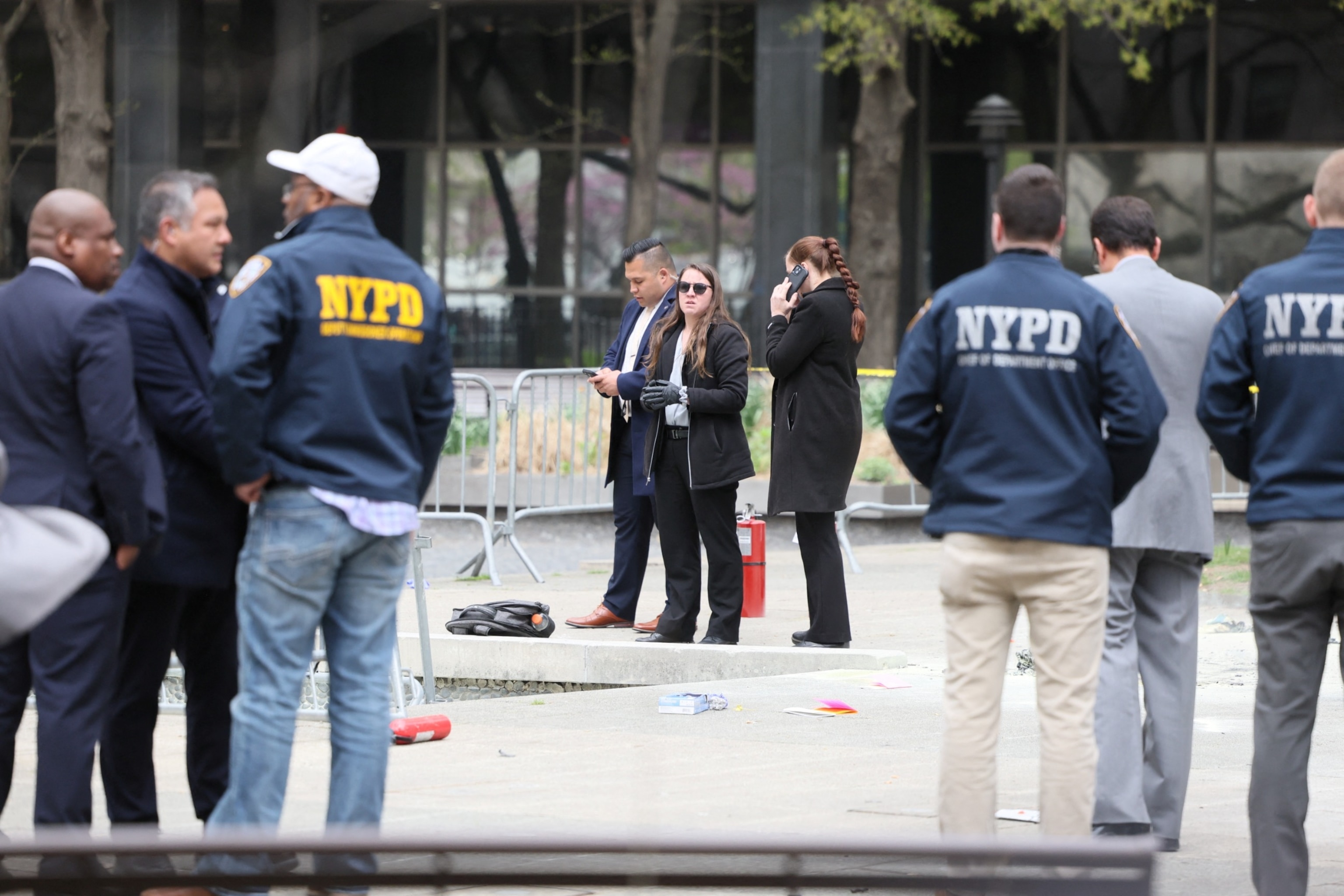 PHOTO: Emergency personnel respond to a report of a person covered in flames, outside the courthouse where former President Donald Trump's criminal hush money trial is underway, in New York, April 19, 2024.