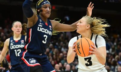 Aaliyah Edwards guards Sydney Affolter during their Final Four matchup.