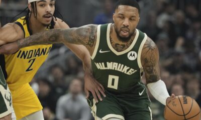 Damian Lillard's 35-point 1st half helps Bucks beat Pacers 109-94 without Giannis in playoff opener