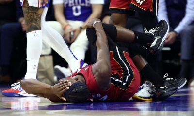 Heat's Jimmy Butler injures knee in play-in loss, set for MRI