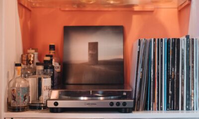 Image showing a vinyl record player and collection of records.