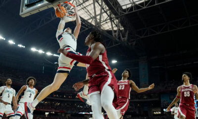 Reigning champ UConn battles Alabama for title spot against Purdue