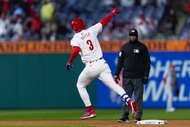 Philadelphia Phillies first baseman Bryce Harper (3) runs the bases after hitting his second home run of the game during the fourth inning against the Cincinnati Reds on Tuesday, April 4, 2024, at Citizens Bank Park in Philadelphia.