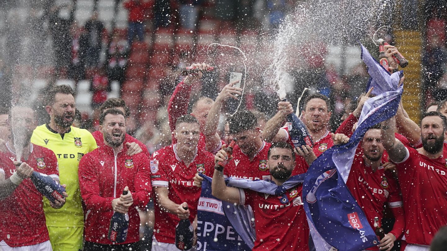 Wrexham gains promotion to English soccer's third division after 6-0 win