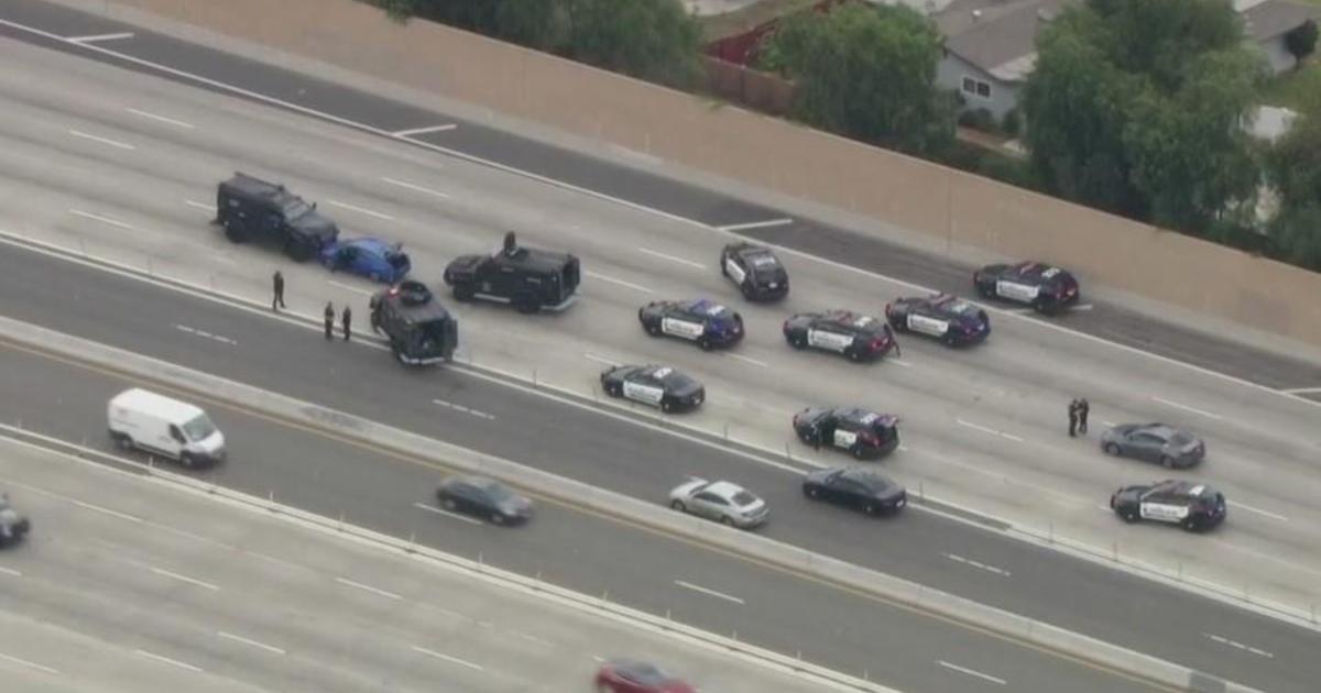 Standoff with armed suspect on 91 freeway in Anaheim ends in fatal shooting
