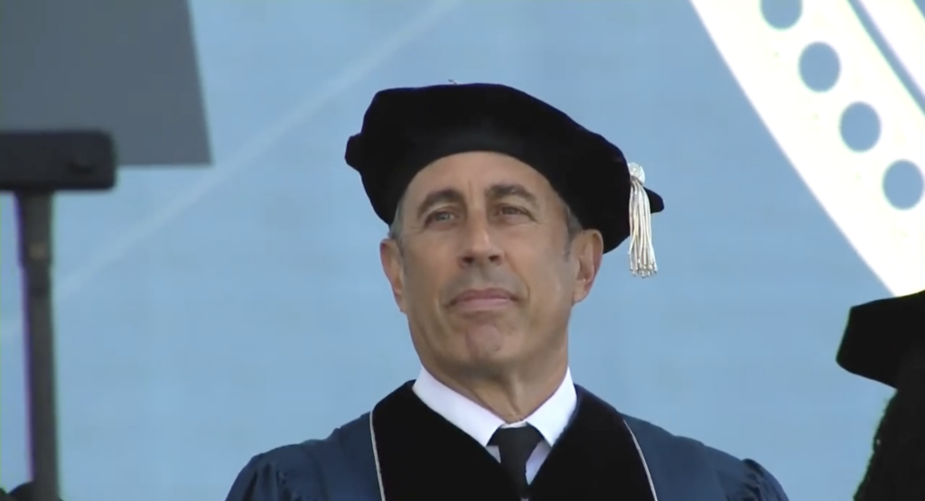 Students walk out as Jerry Seinfeld, a recent Israel advocate, delivers Duke commencement address