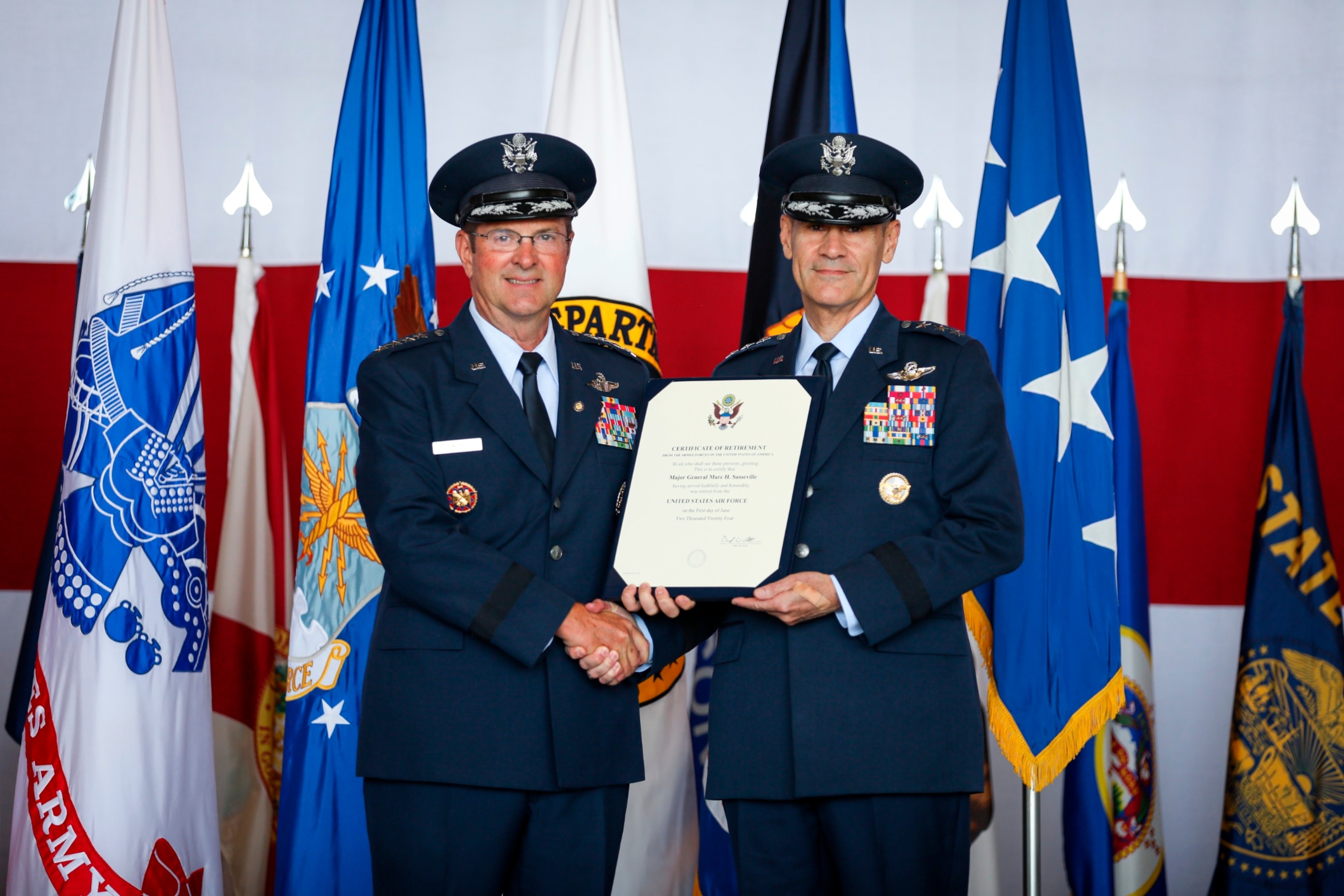 PHOTO: Retired Air Force Gen. Joseph Lengyel, the 28th Chief of the National Guard Bureau, hosts the retirement ceremony for Air Force Lt. Gen. Marc Sasseville, the 12th Vice Chief, National Guard Bureau, Joint Base Andrews, May 29, 2024, in Maryland.