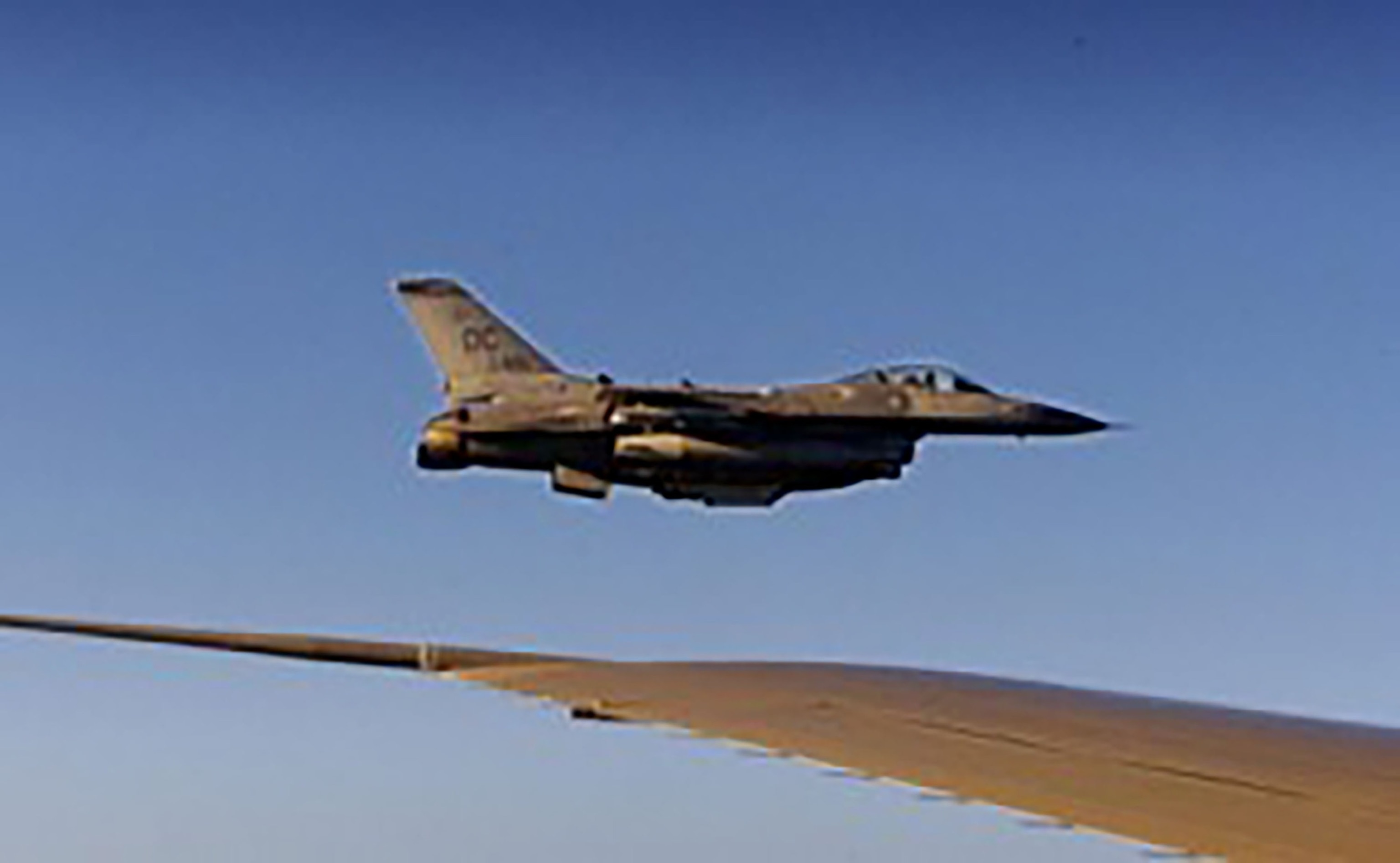 PHOTO: F-16 pilot Marc Sasseville escorting Air Force One and Pres. George W. Bush on Sept. 11, 2001.