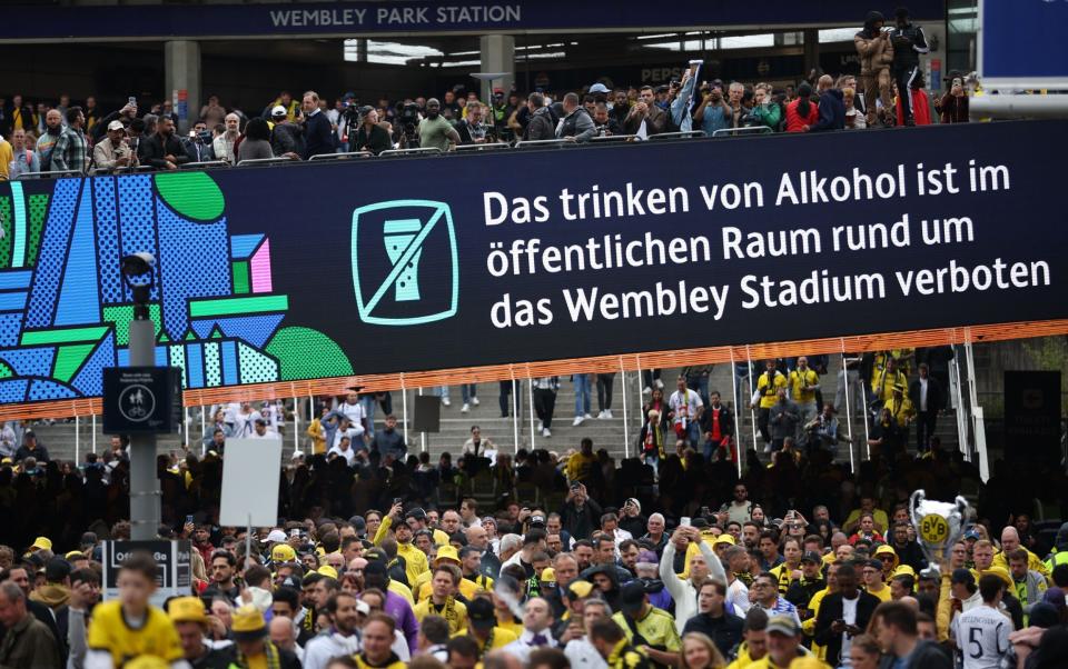 Visiting fans from Germany were reminded of the Wembley Stadium alcohol ban on the way in