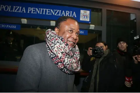 Getty Images Patrick Lumumba standing outside a courthouse in 2015