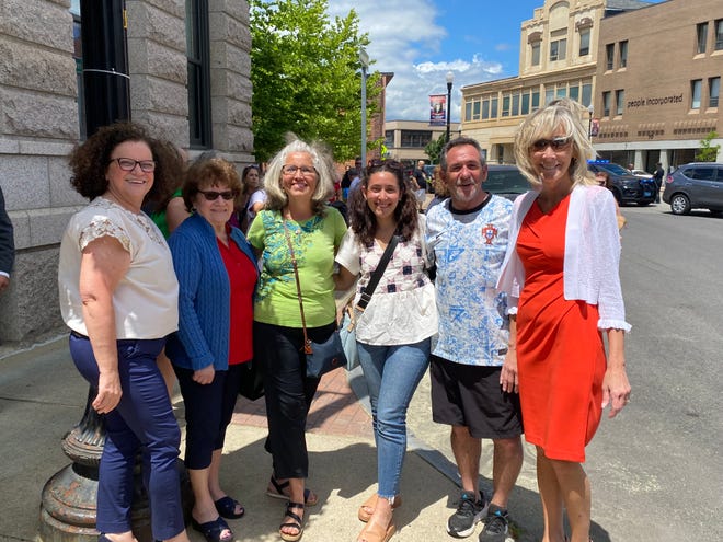 Taunton Mayor Shaunna O'Connell, right, stands with other attendees at the Day of Portugal flag raising ceremony outside City Hall on Saturday, June 8, 2024.