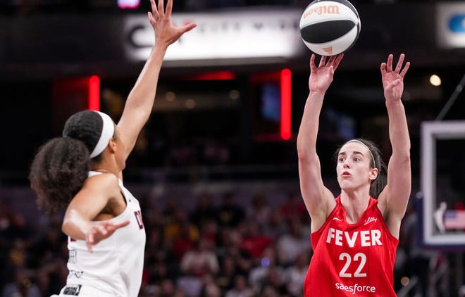 Indiana Fever guard Caitlin Clark (22) shoots the ball Thursday, June 13, 2024, during the game at Gainbridge Fieldhouse in Indianapolis.