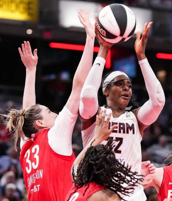 Atlanta Dream forward Cheyenne Parker-Tyus (32) passes the ball against Indiana Fever forward Katie Lou Samuelson (33) on Thursday, June 13, 2024, during the game at Gainbridge Fieldhouse in Indianapolis. The Indiana Fever defeated the Atlanta Dream, 91-84.