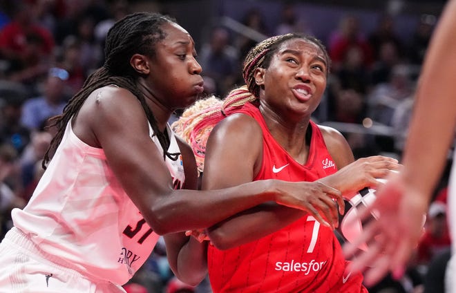 Indiana Fever forward Aliyah Boston (7) rushes in for a lay-up against Atlanta Dream center Tina Charles (31) on Thursday, June 13, 2024, during the game at Gainbridge Fieldhouse in Indianapolis.