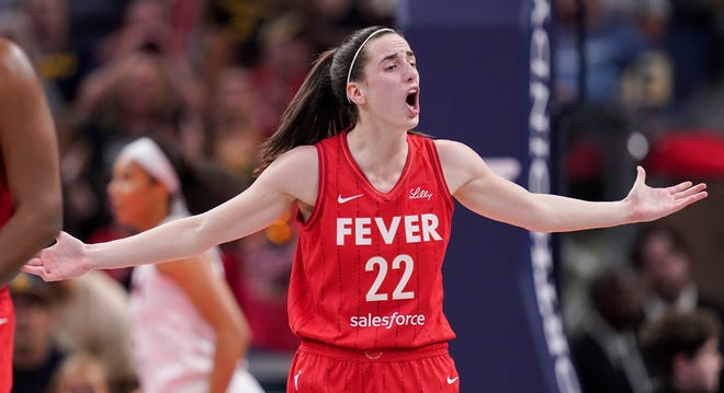 Indiana Fever guard Caitlin Clark (22) yells to the referee Thursday, June 13, 2024, during the game at Gainbridge Fieldhouse in Indianapolis. The Indiana Fever defeated the Atlanta Dream, 91-84.