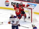 SUNRISE, FLORIDA - JUNE 24: Connor McDavid #97 of the Edmonton Oilers reacts to the loss as Sergei Bobrovsky #72 and Sam Reinhart #13 of the Florida Panthers celebrate after Game Seven of the 2024 Stanley Cup Final at Amerant Bank Arena on June 24, 2024 in Sunrise, Florida. The Florida Panthers defeated the Edmonton Oilers 2-1 to win the Stanley Cup.