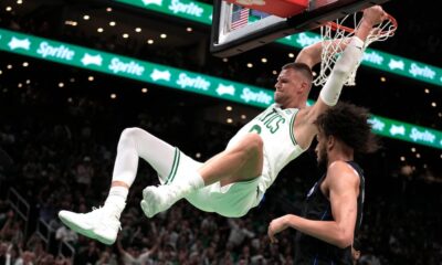 Brown has 22, Porzingis returns with 20 as Celtics open NBA Finals with 107-89 win over Mavericks