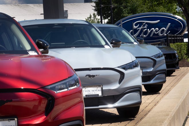 Ford Mustang Mach E electric vehicles are offered for sale at a dealership on June 05, 2024 in Chicago, Illinois.