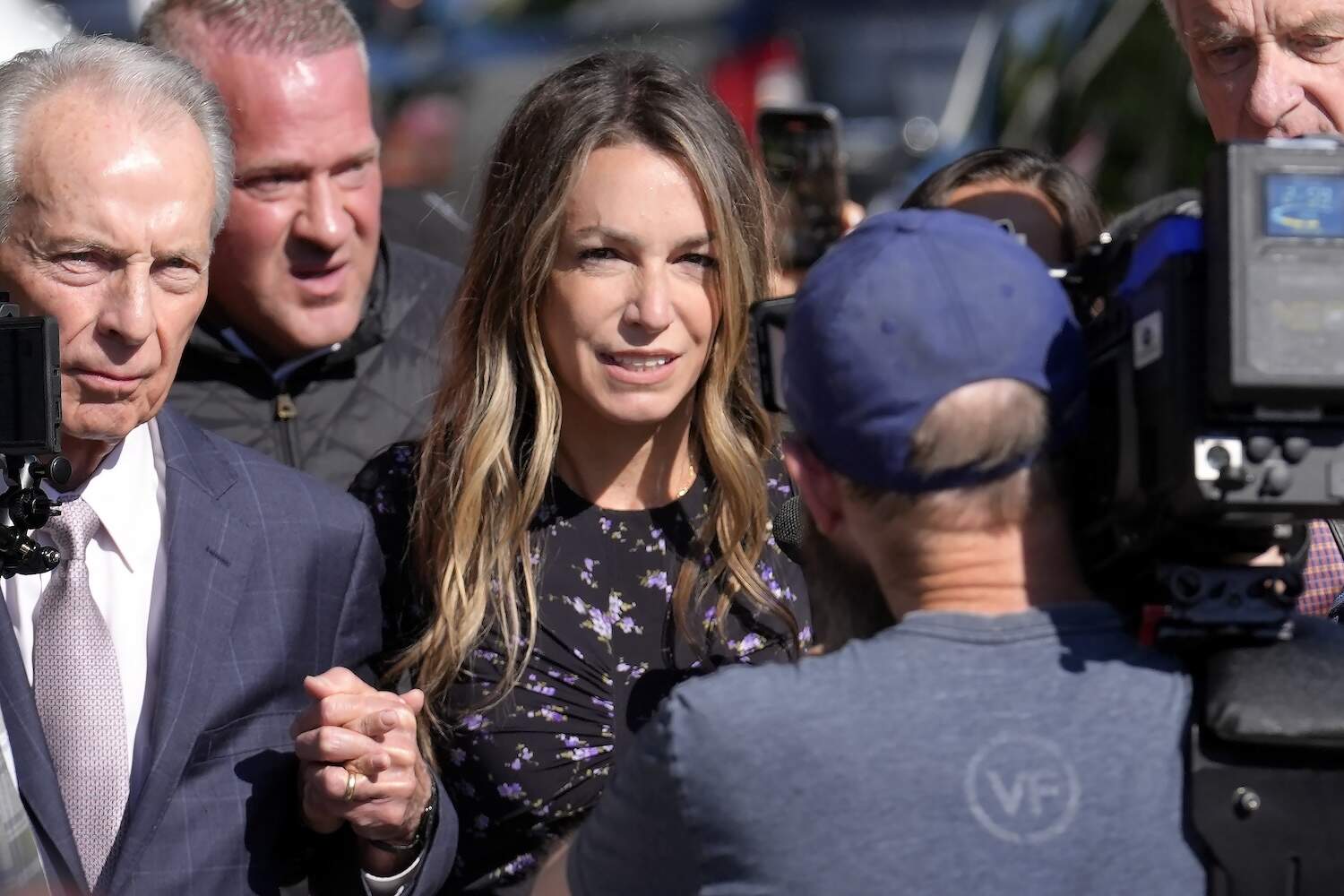 Karen Read, center, arrives at Norfolk Superior Court with her father William Read, left, Tuesday, June 25, 2024, in Dedham, Mass. (Steven Senne/AP)