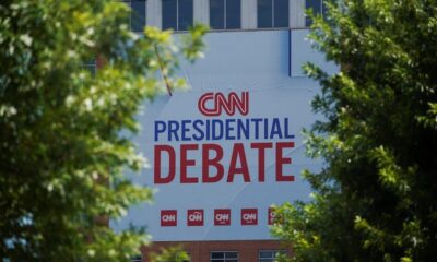 Signs promoting the debate between U.S. President Joe Biden and his rival Donald Trump are erected around the venue at CNN Center in Atlanta, Georgia, U.S. June 24, 2024. REUTERS/Megan Varner