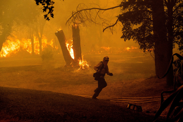 A firefighter runs