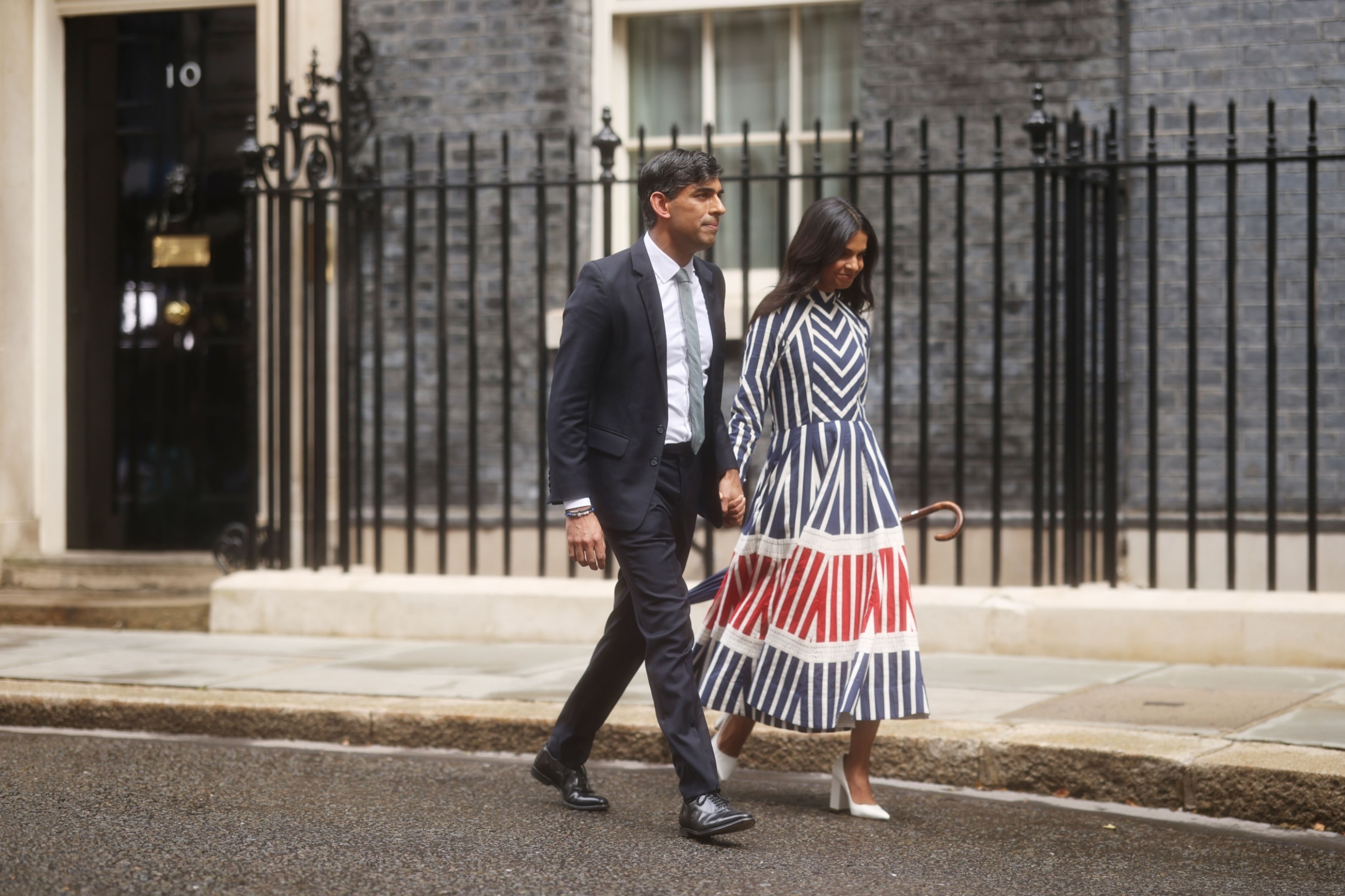 PHOTO: Outgoing Conservative Prime Minister Rishi Sunak and wife Akshata Murty leave 10 Downing Street following Labour's landslide election victory on July 5, 2024, in London.