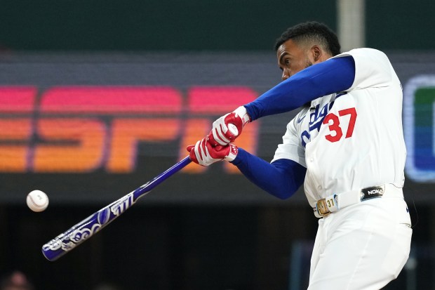 Dodgers outfielder Teoscar Hernández bats during the Home Run Derby...