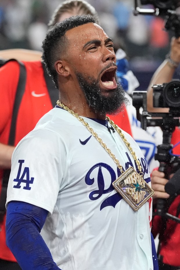 Dodgers outfielder Teoscar Hernández celebrates after winning the All-Star Home...