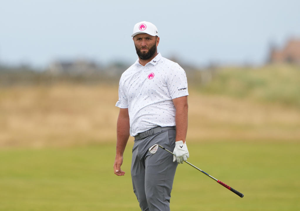 Golf - The 152nd Open Championship - Royal Troon Golf Club, Troon, Scotland, Britain - July 19, 2024 Spain's Jon Rahm watches his chip onto the 1st green during the second round REUTERS/Maja Smiejkowska