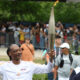 Why is Snoop Dogg at Olympics? Snoop Dogg carries the Olympic torch before opening ceremony in Paris