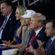 Jason Aldean (3rd from left) and his wife Brittany Aldean (2nd from left) sit with Republican presidential nominee Donald J. Trump during the final day of the Republican National Convention at the Fiserv Forum. The final day of the RNC featured a keynote address by Republican presidential nominee Donald Trump.