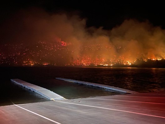 Lake Oroville Spillway launch ramp with the Thompson Fire in the background. Photo from California State Parks.