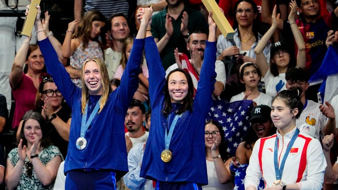 Torri Huske, Gretchen Walsh win gold, silver in women's 100 butterfly