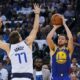 March 23, 2019; Oakland, CA, USA; Golden State Warriors guard Klay Thompson (11) shoots the basketball against Dallas Mavericks forward Luka Doncic (77) during the third quarter at Oracle Arena. Mandatory Credit: Kyle Terada-USA TODAY Sports