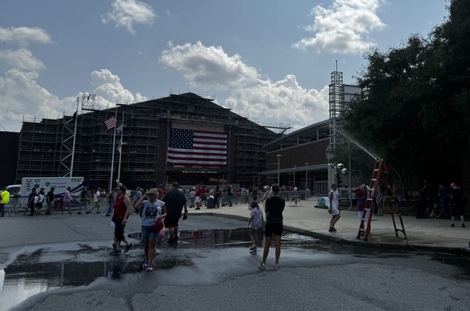 A long line of people wait to enter the New Holland Arena for the Trump rally July 31, 2024.