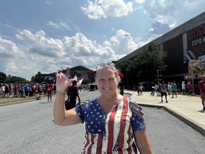 JoEllen Holler, 54, of Denver, Pa., waits to enter the  Pennsylvania Farm Show complex for a rally by Donald Trump July 31, 2024.