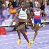 Julien Alfred, of St. Lucia, celebrates after winning the women's 100-meters final at the Paris Olympics, Saturday, Aug. 3, 2024, in Saint-Denis, France.