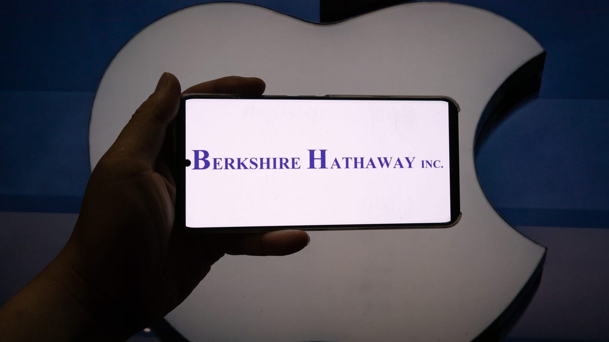 Apple stock sinks after Warren Buffett's Berkshire Hathaway halves stake