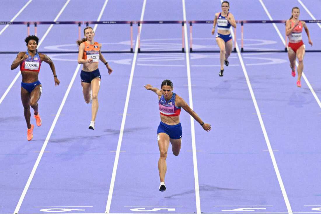 USA's Sydney McLaughlin-Levrone crosses the finish one-and-a-half seconds ahead of her teammate and silver medalist Anna Cockrell in the women's 400m hurdles final. McLaughlin-Levrone eclipsed her own world record during the gold medal run at the Paris Olympics on Thursday.