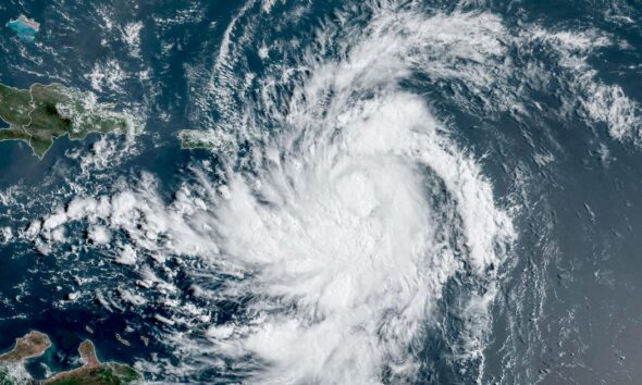 Tropical Storm Ernesto expected to strengthen into a hurricane in the Atlantic