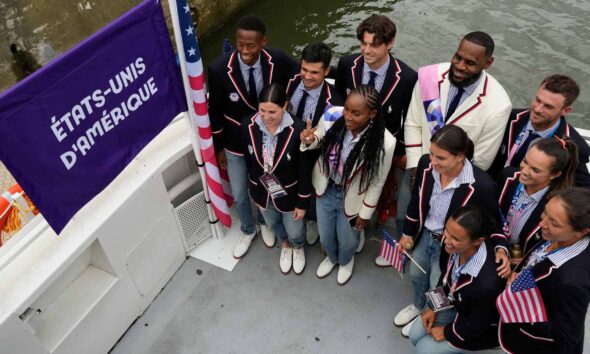 The American Olympics tennis team with NBA legend LeBron James during the Opening Ceremony.